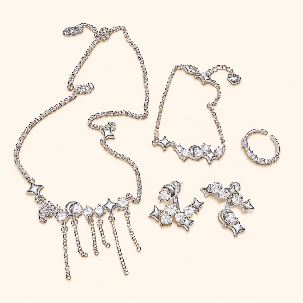 Women’s Celestial Cubic Zirconia Necklace, Earrings, Bracelet & Ring Set with Star and Tassel Details