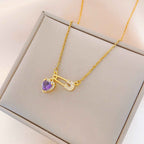 Women’s Dainty Safety Pin Necklace with Pink Heart and Sparkling Stone Detail