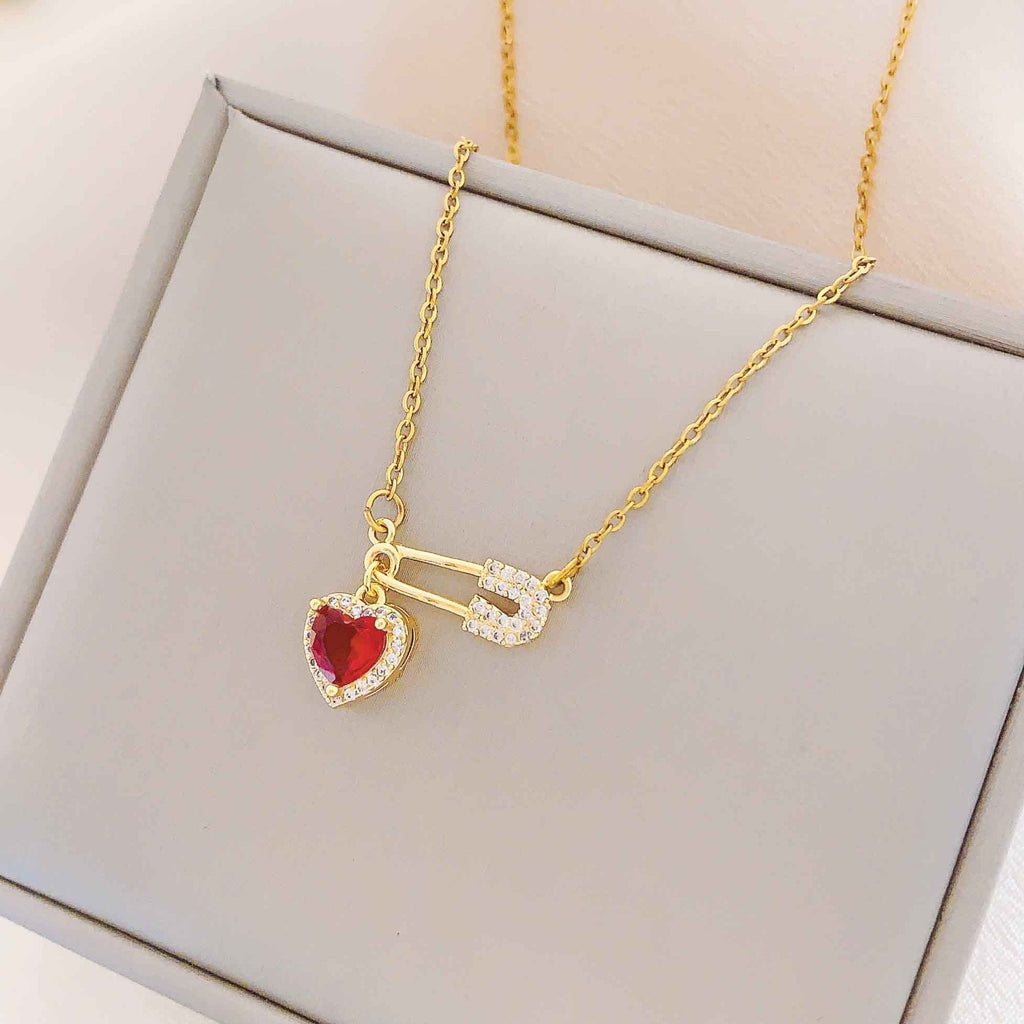 Women’s Dainty Safety Pin Necklace with Pink Heart and Sparkling Stone Detail