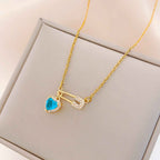Women’s Dainty Safety Pin Necklace with Pink Heart and Sparkling Stone Detail