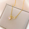 Women’s Dainty Safety Pin Necklace with Pink Heart and Sparkling Stone Detail