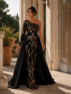 Women’s Black Gold Glamorous Sequin One-Shoulder One Long Sleeve Fitted Maxi Prom Dress with Belted Cape Detail